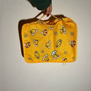 Sanrio Yellow Travel Bag with Gudetama Design